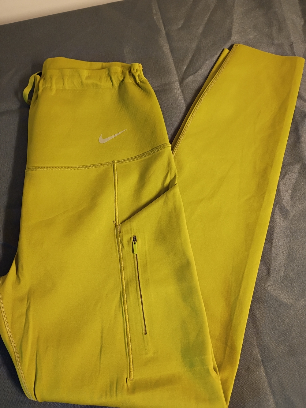 Nike Go Women's Yellow Performance Leggings with Zip Pocket